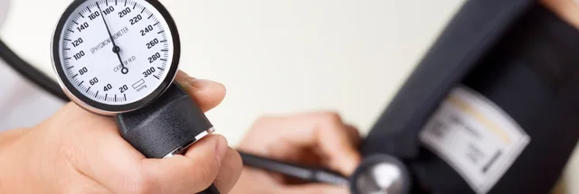 Blood pressure being measured with a cuff